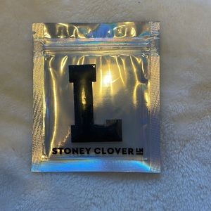 Stoney Clover black with sparkle “L” patch